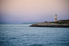 Remote Franklin Island Light Tower as Sun Sets in Maine